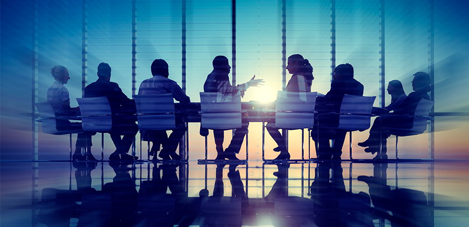 business people sitting at a table