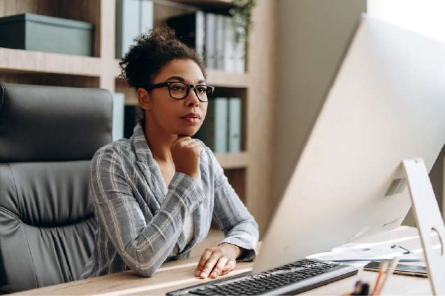 Women Reviewing Computer